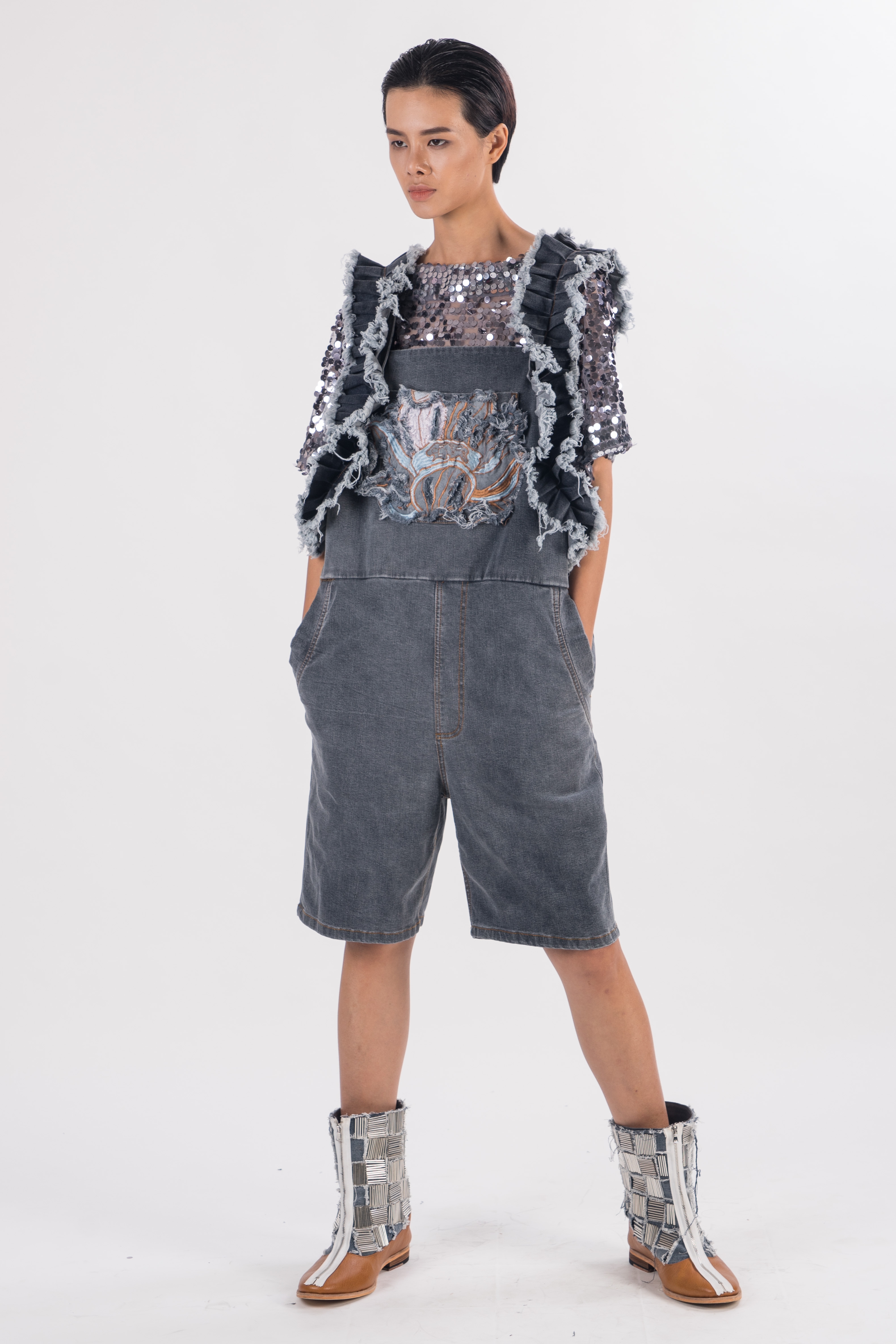 Washed denim shorts jumpsuit with  machine embroidered lotus 