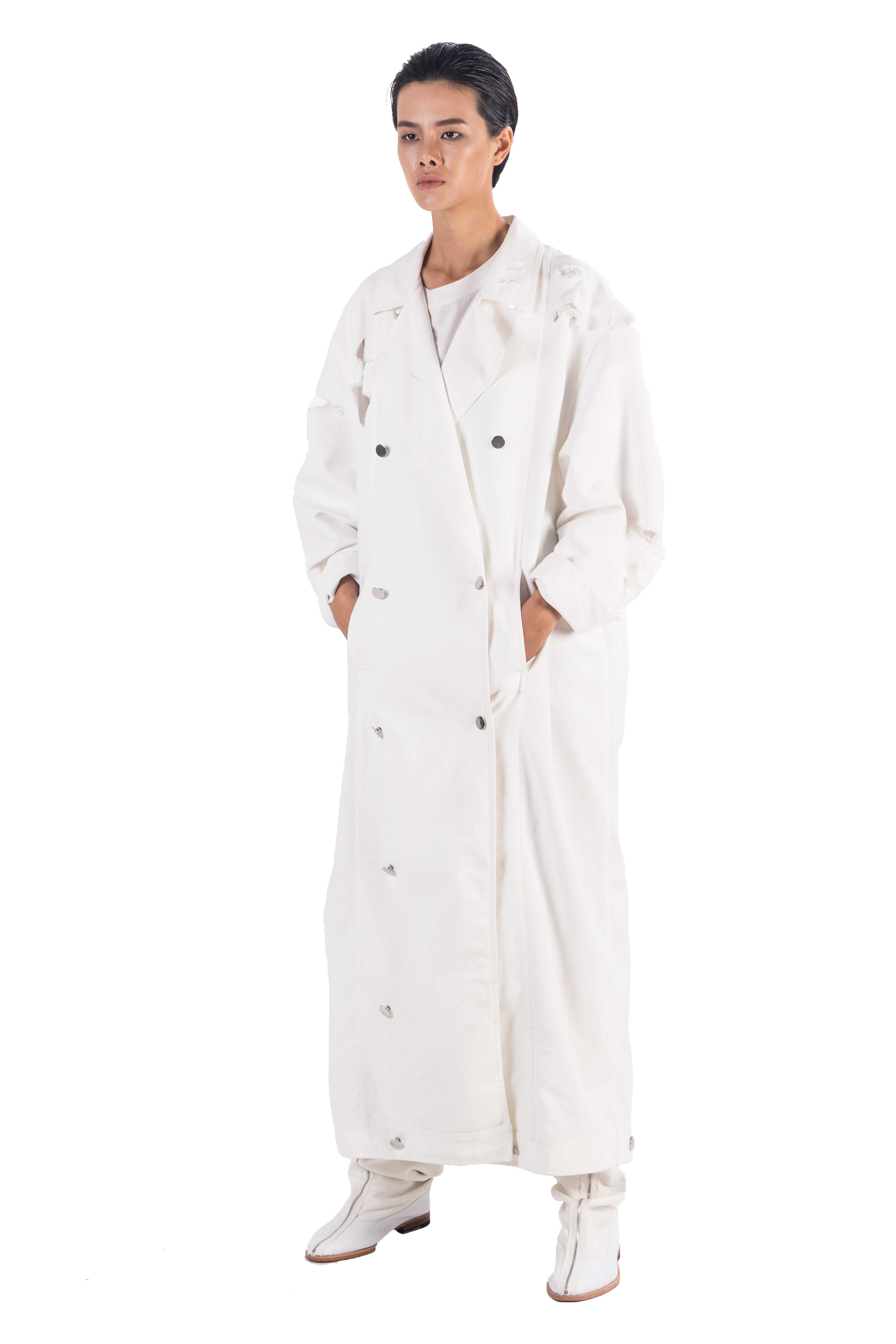 White  double breasted long heavy cotton coat with rips on shoulder and sleeves