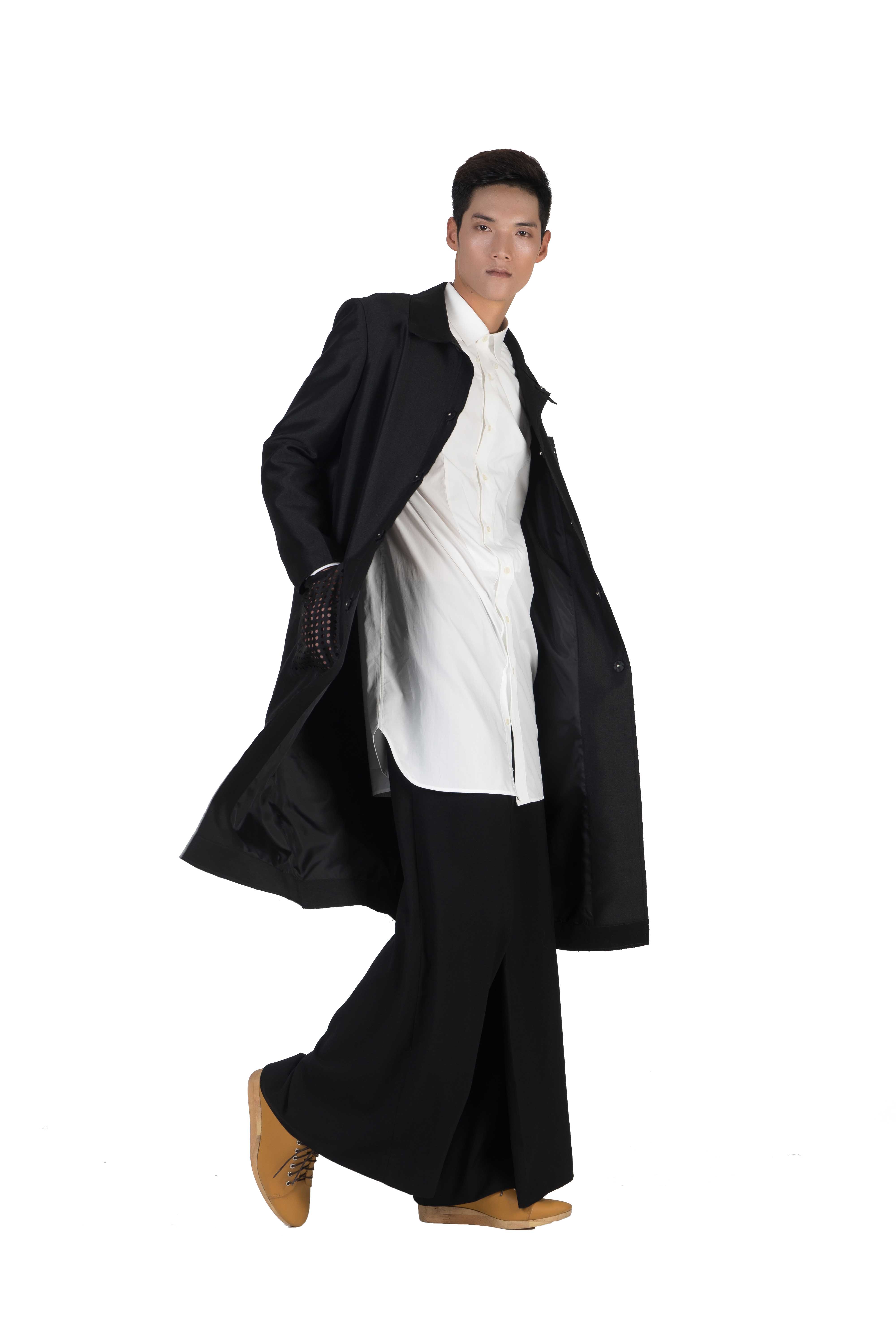 Knee length black taffeta laser cut out detailing coat