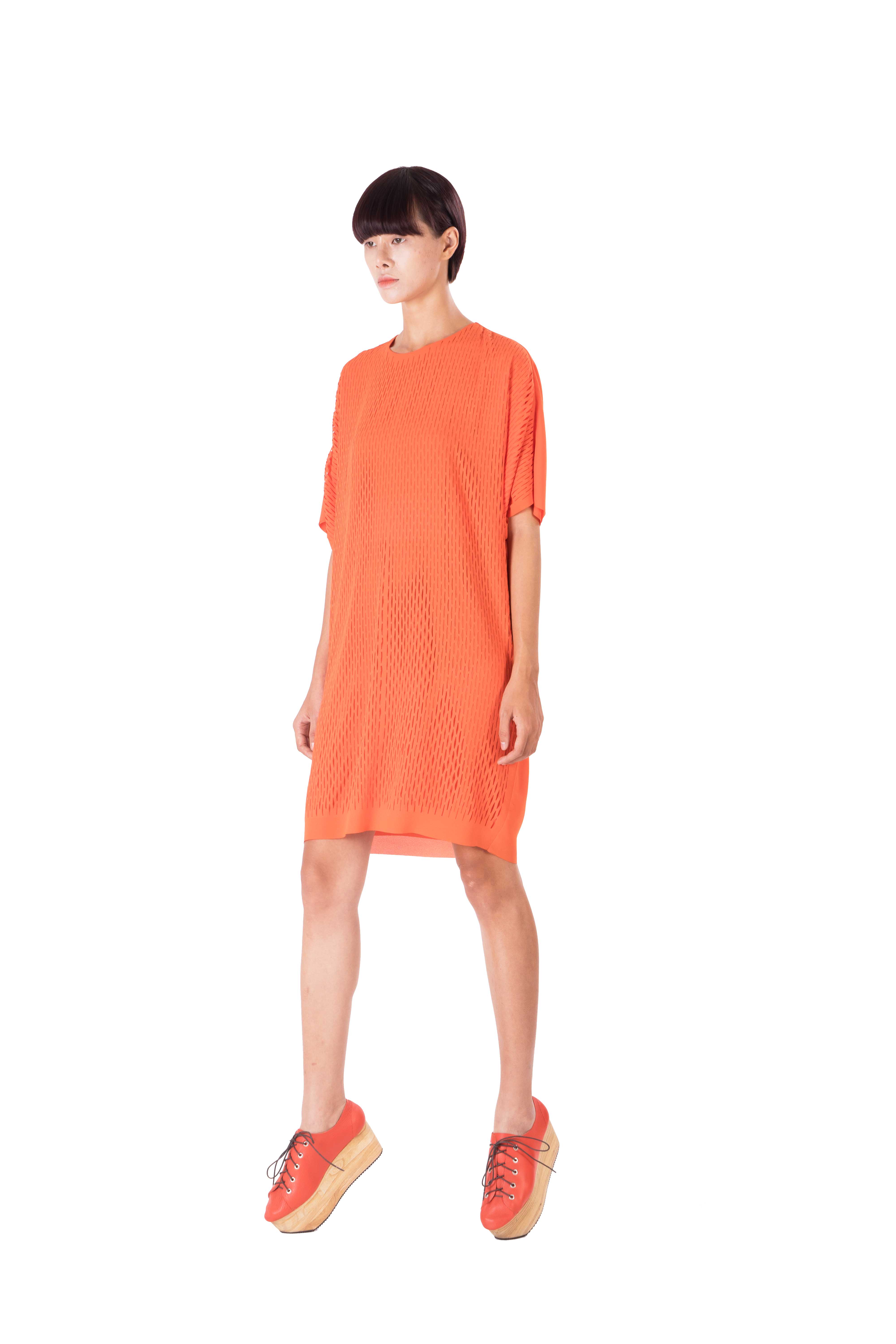 Orange dress with kimono style sleeves with laser cut out detailing in front
