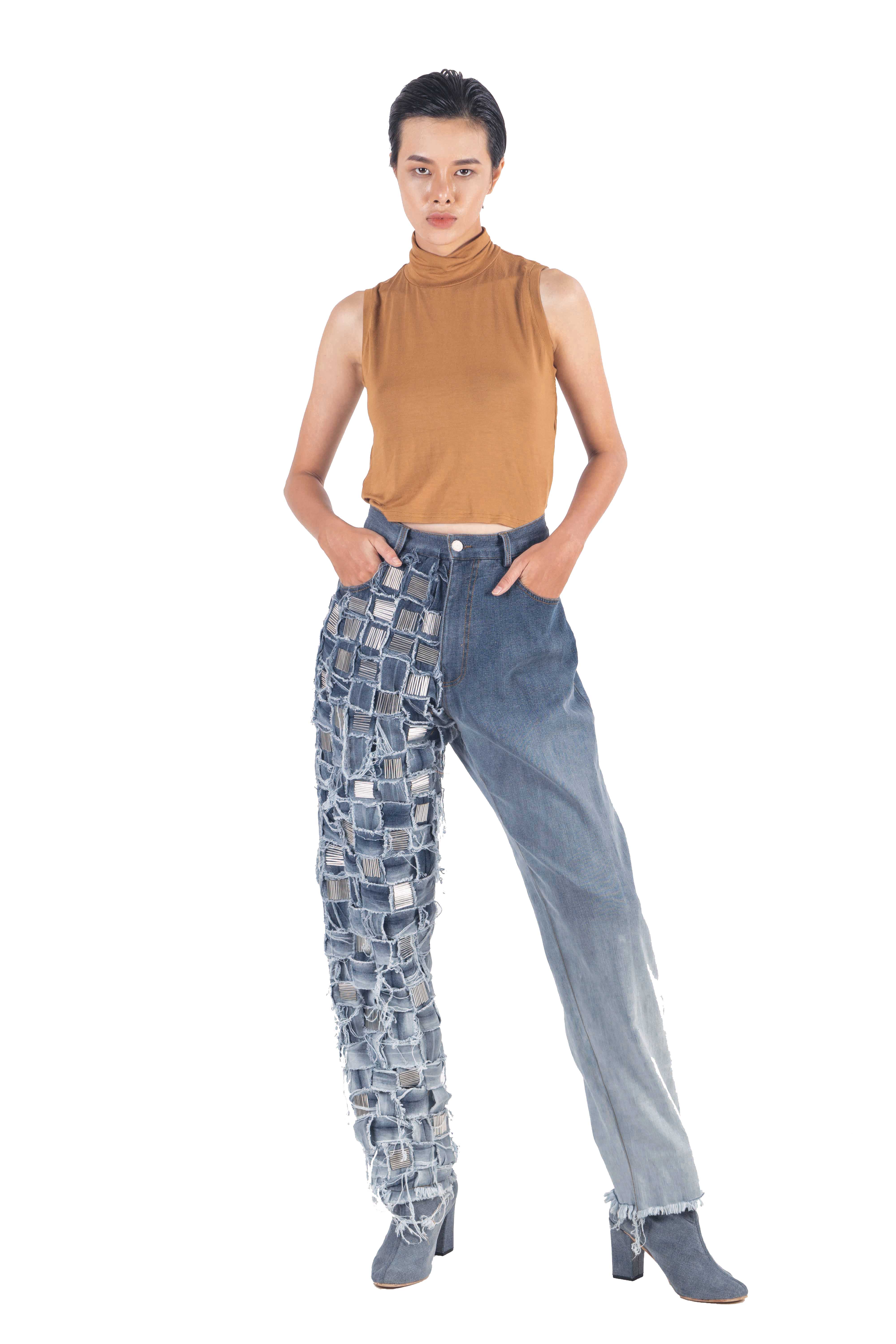 Washed denim pants with right hand woven panel with hand embellishments