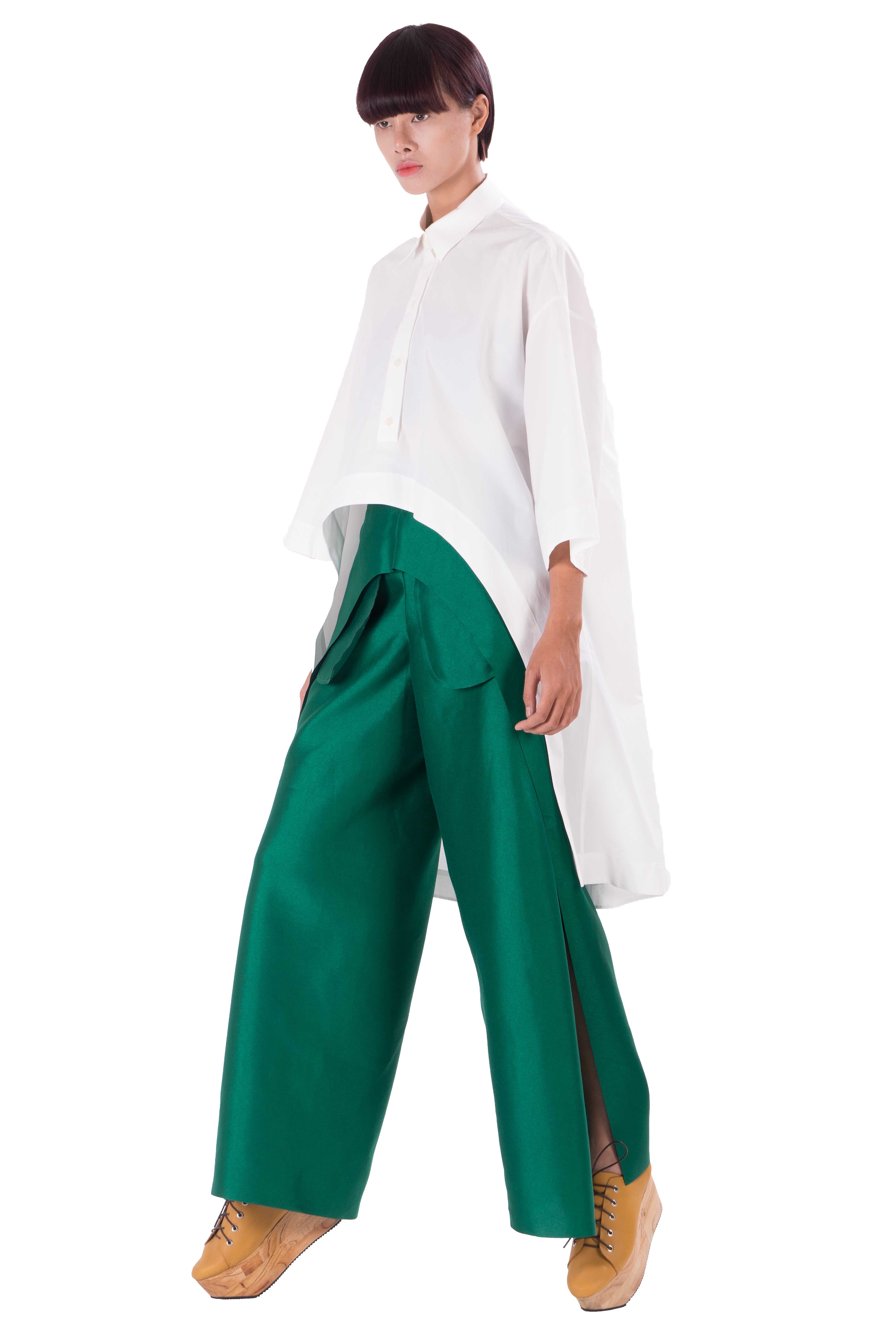 Green taffeta trousers with laser cut edges