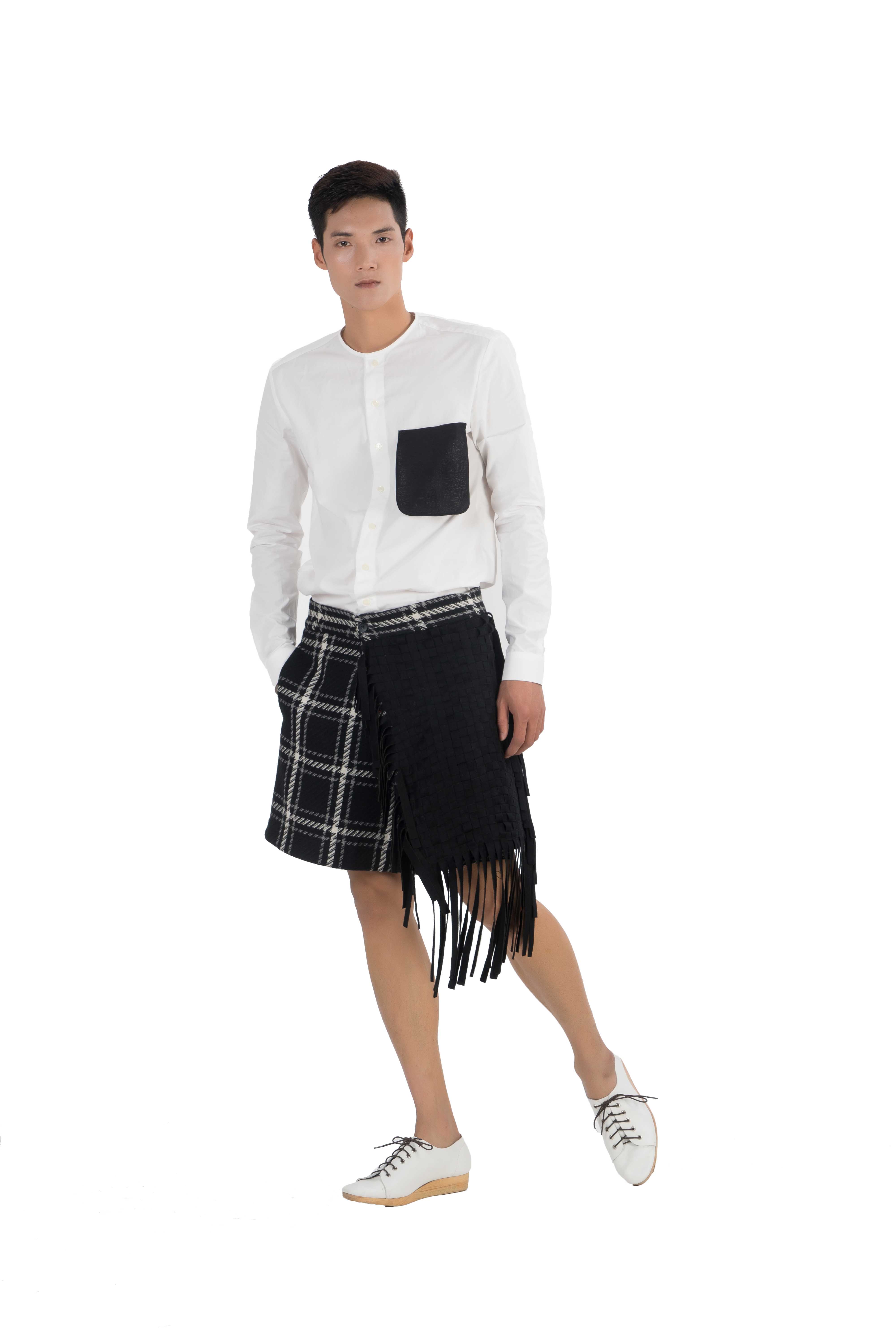 Wrap style wool blend checked shorts with woven panel and fringes