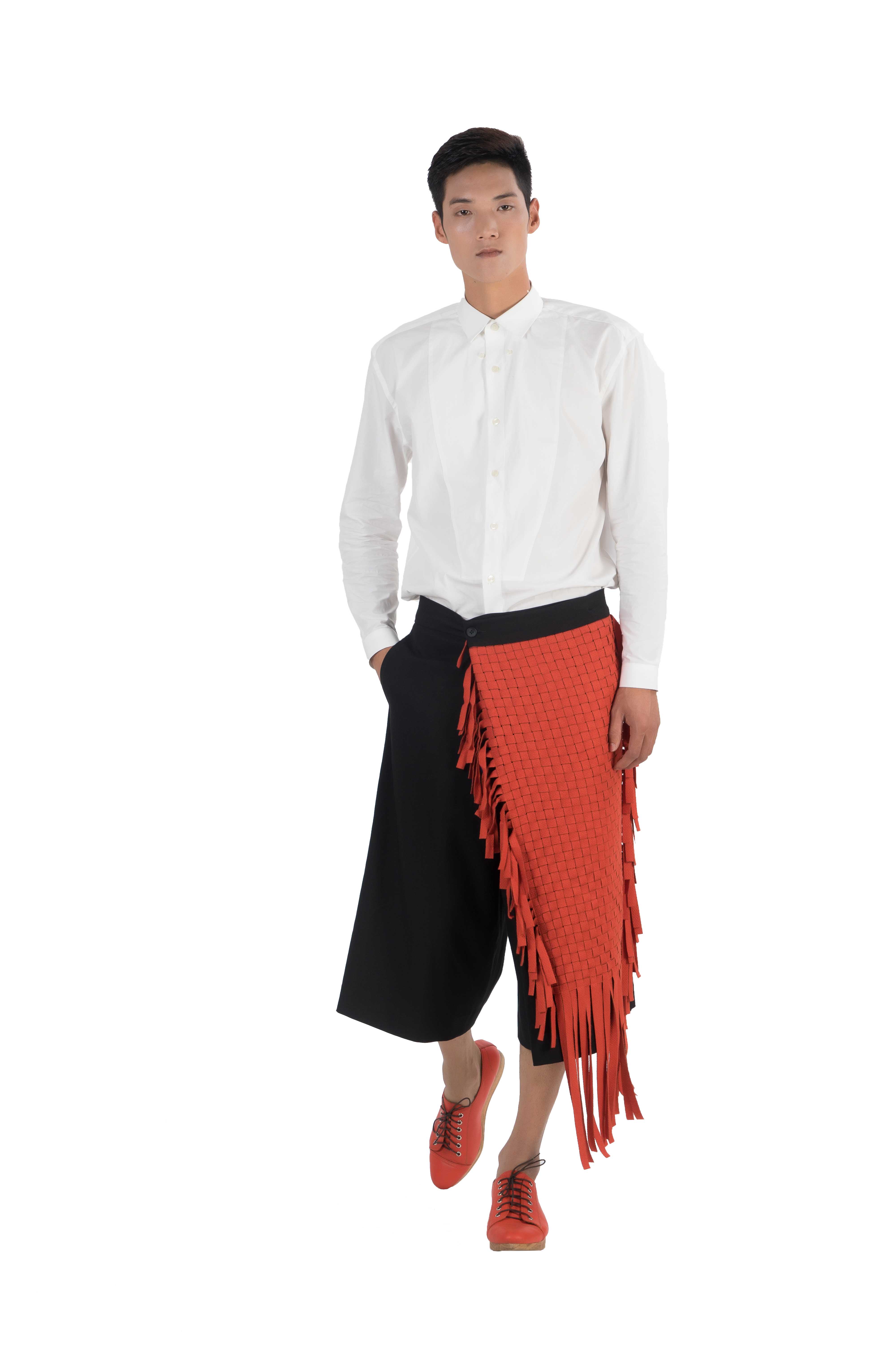 Wrap style knee length wide shorts with orange wool blend woven panel and fringes