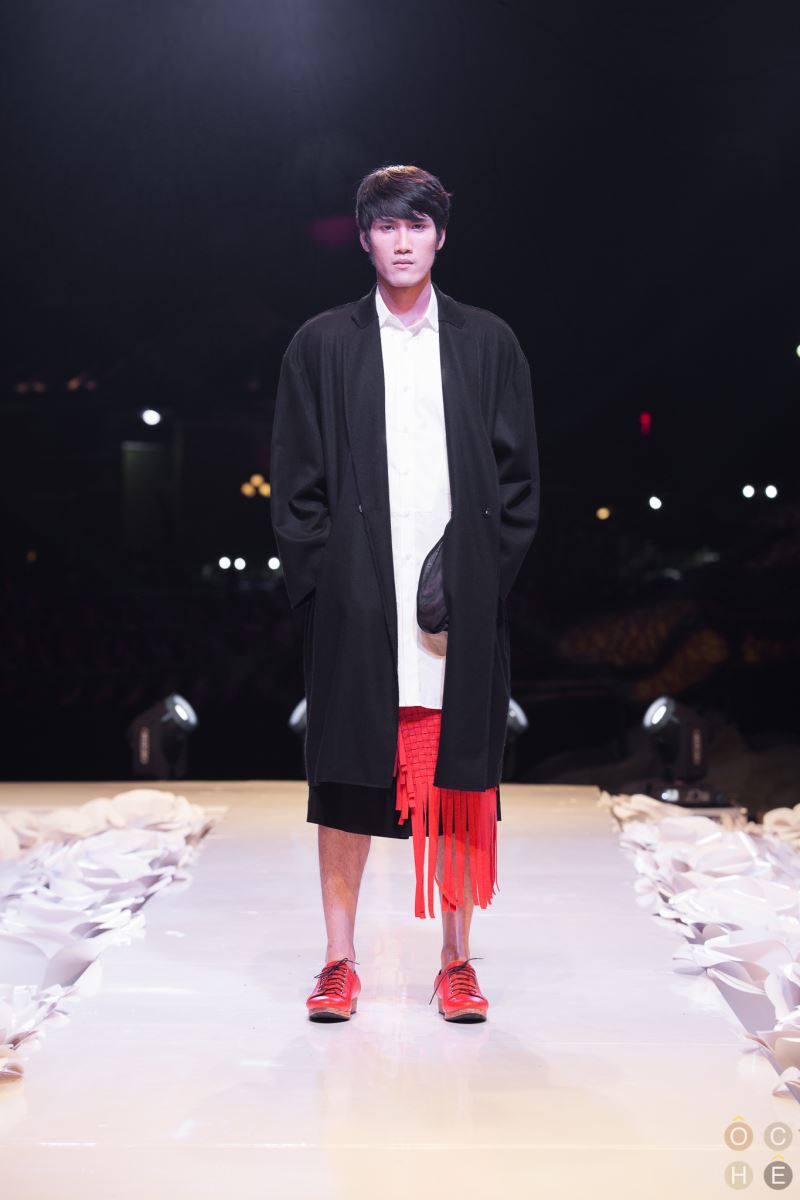 Knee length wool blend coat with laser cut out detailing