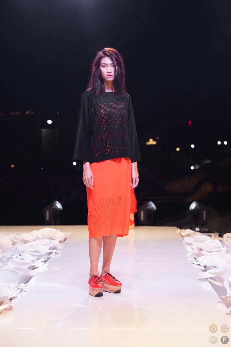 Kimono style top with laser detailing.