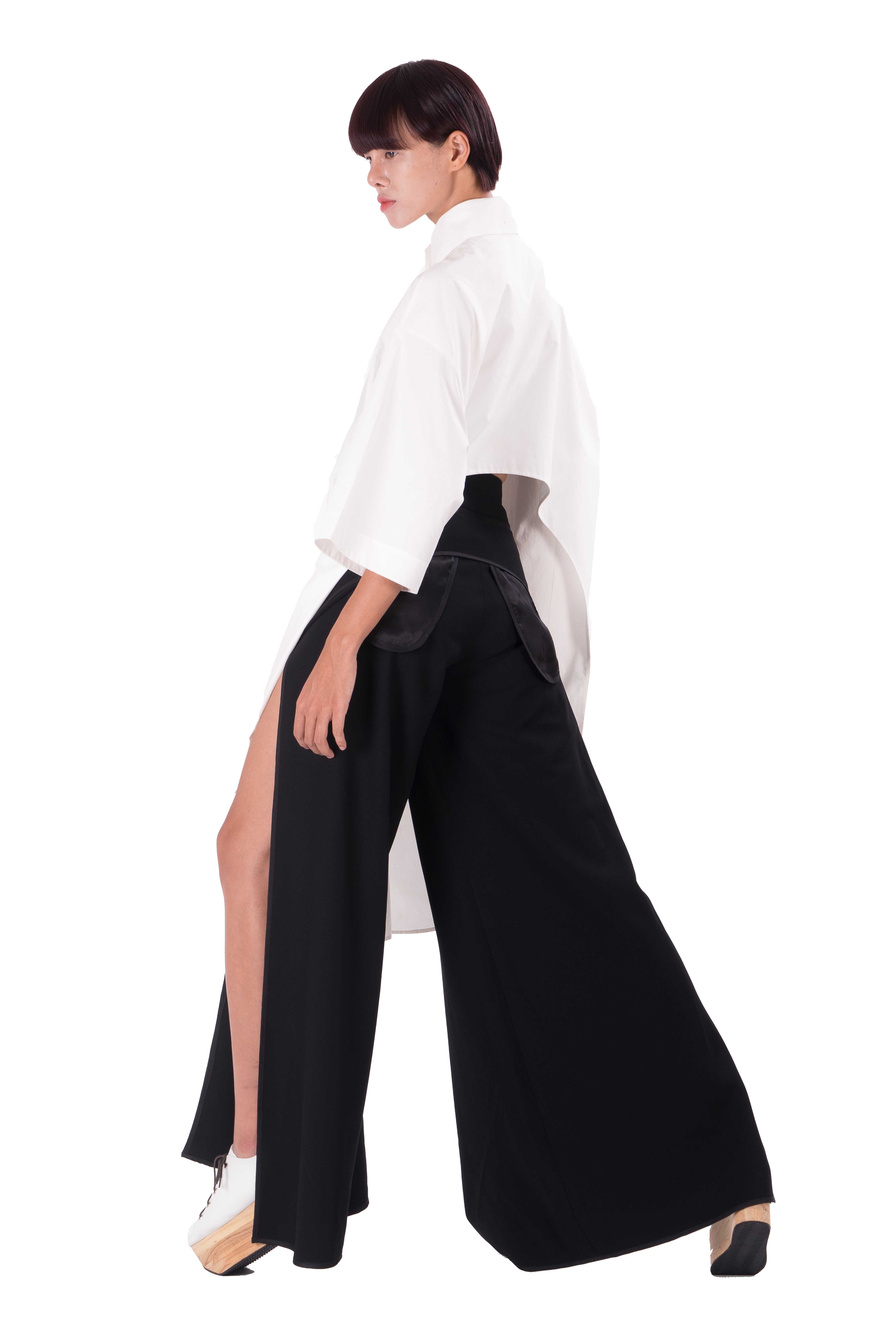 Black wrap trousers with laser cut