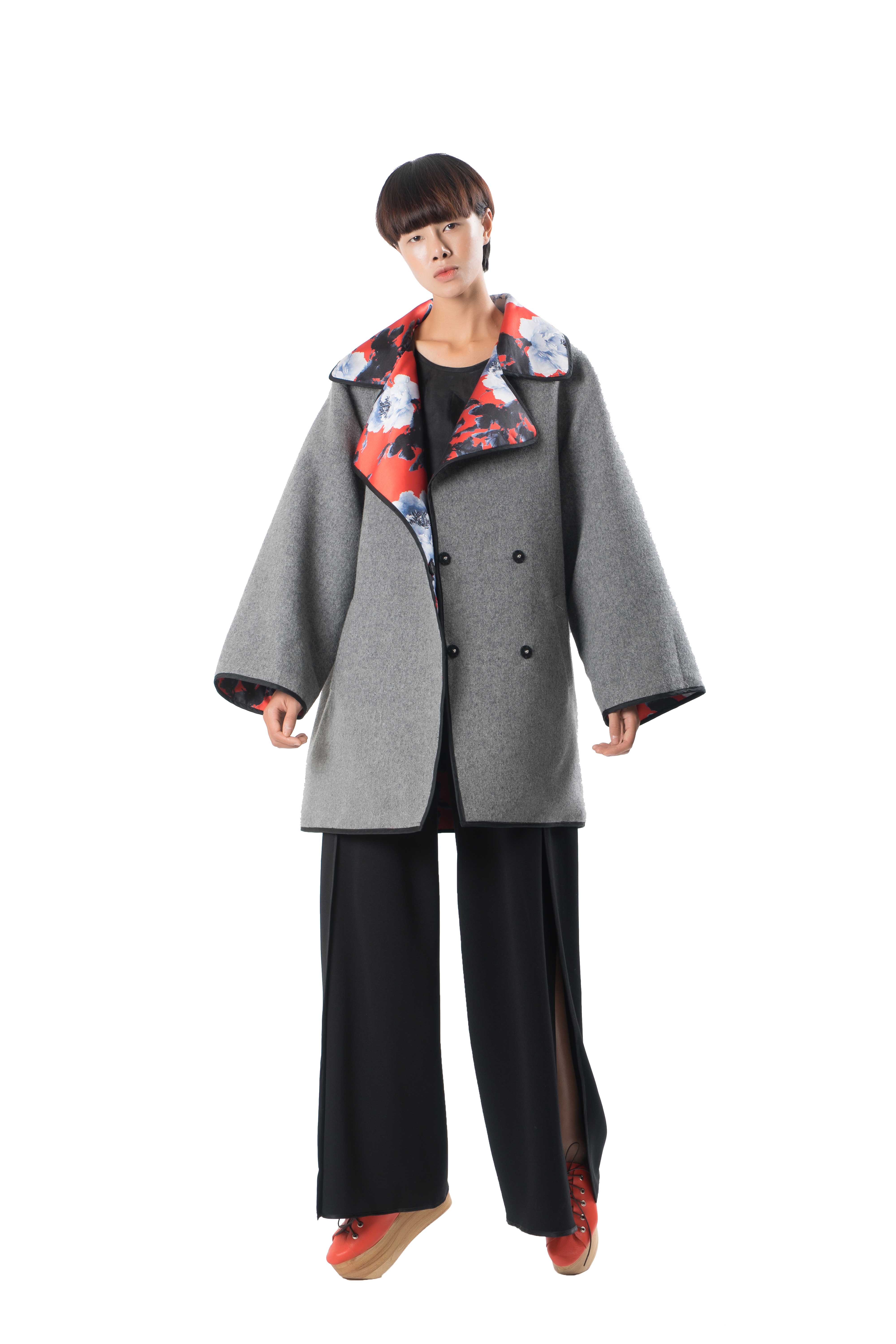 Reversible loose fit coat with piping.