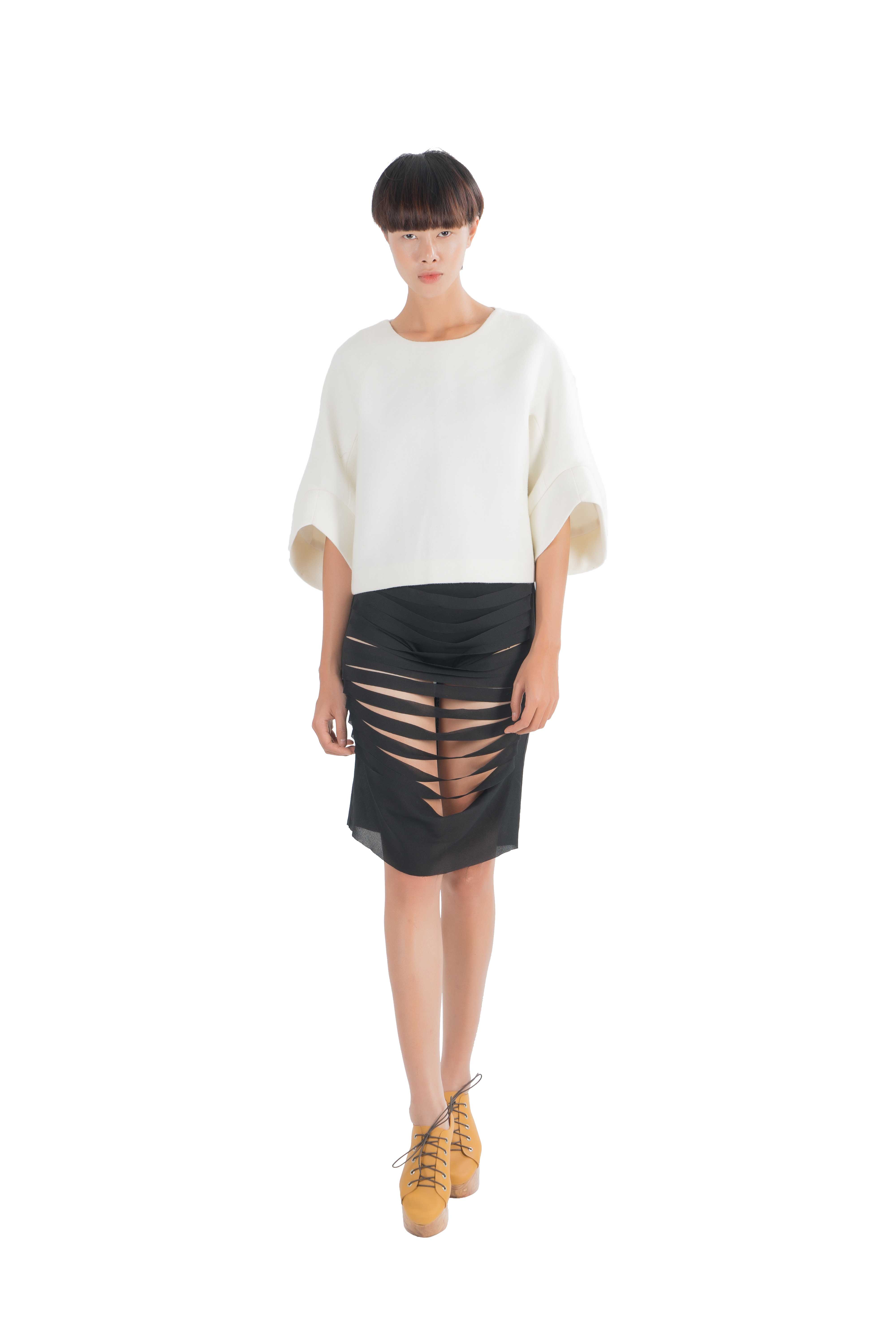 Black viscose skirt with laser cut out details